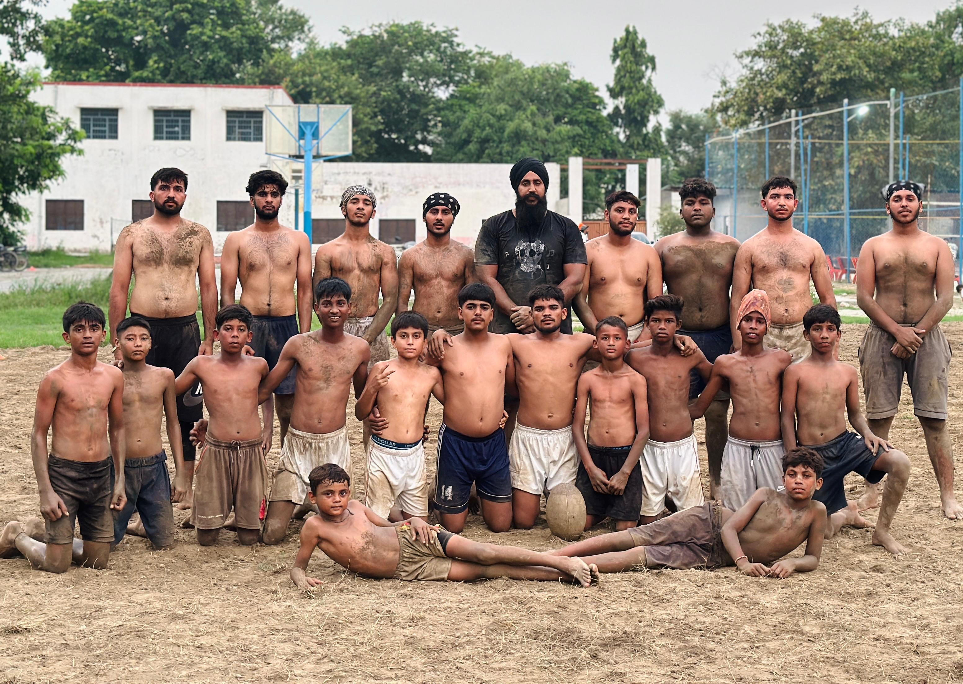 Grassroots rugby players and young athletes training in Punjab — the heart of BIRD's mission